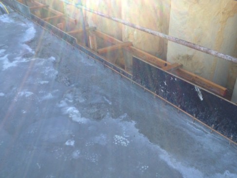 Rugasol spillage around upstand wall Image