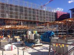 As the building goes up storage for plant and equipment becomes tight. Arrival, unloading and storage of 8 ton chiller required careful planning. 