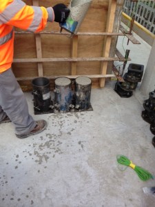 Segregation in the sample will be demostrated by aggregate gradually moving to the bottom of the cylinder, thus increasing  the average density to the bottom. 