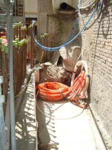 View of capping beam. Survey required of right edge, acces via broken ground behind orange pipe next to exposed scafold bars