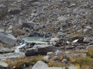 The pool feeding the micro hydro station. The dam obviously requiring some maintenance due to the weather.