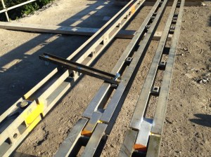 The cross bracing has pulled out of it's alignment. NB, this was not bolted as the cords are left free to creep through construction. The construction method was instructed by the supplier.