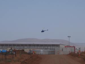 Helicopter Spraying the Roof