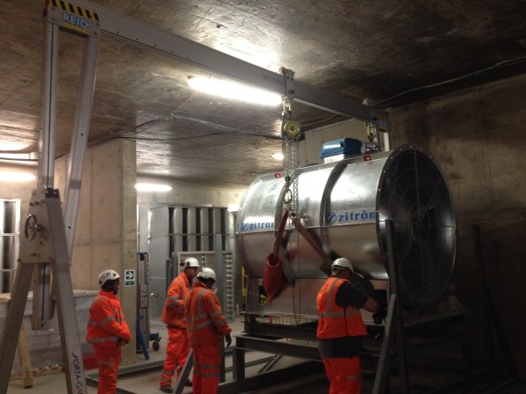 Lowering fan onto frame